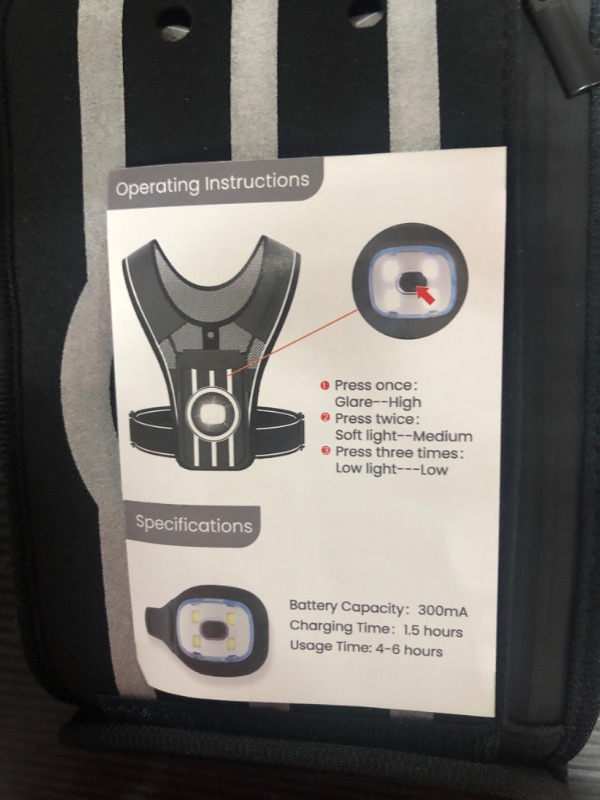 Photo 2 of Reflective Running Vest with LED Light and Phone Holder