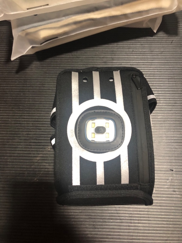 Photo 1 of Reflective Running Vest with LED Light and Phone Holder