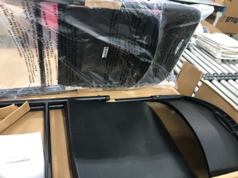 Photo 2 of Amazon Basics Folding Plastic Chair, 350-Pound Capacity, Black, 2-Pack
