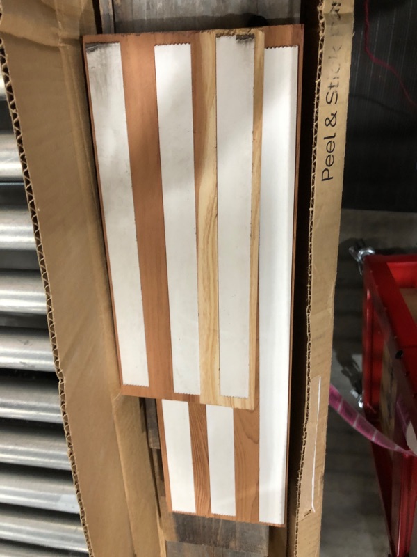 Photo 1 of   Wood Planks  Premium Set of 11 Wood Planks (19.5 sq. ft. per Box) Charcoal (Black) peel and stick 
