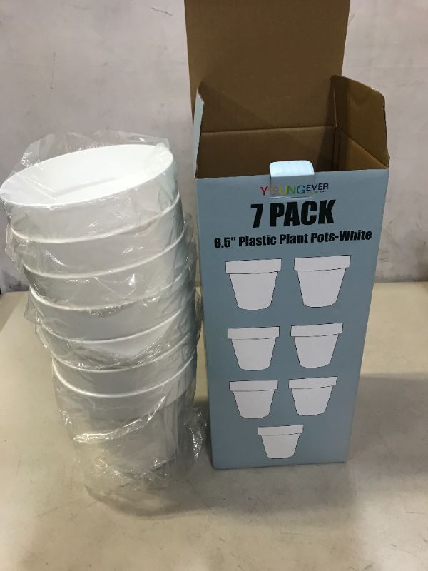 Photo 1 of 6.5" PLASTIC PLANT POTS 7 PACK