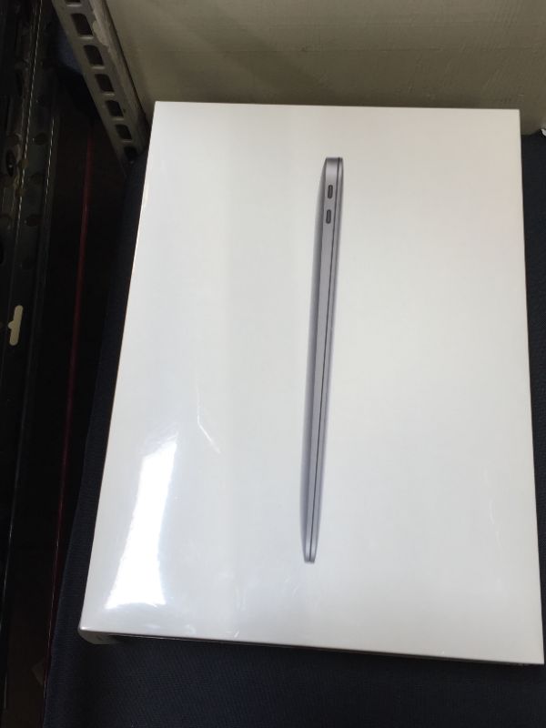 Photo 2 of Apple 13-in MacBook Air W Retina Display: M1, 8GB RAM, 512GB SSD - Space Gray (2020)
(factory sealed)