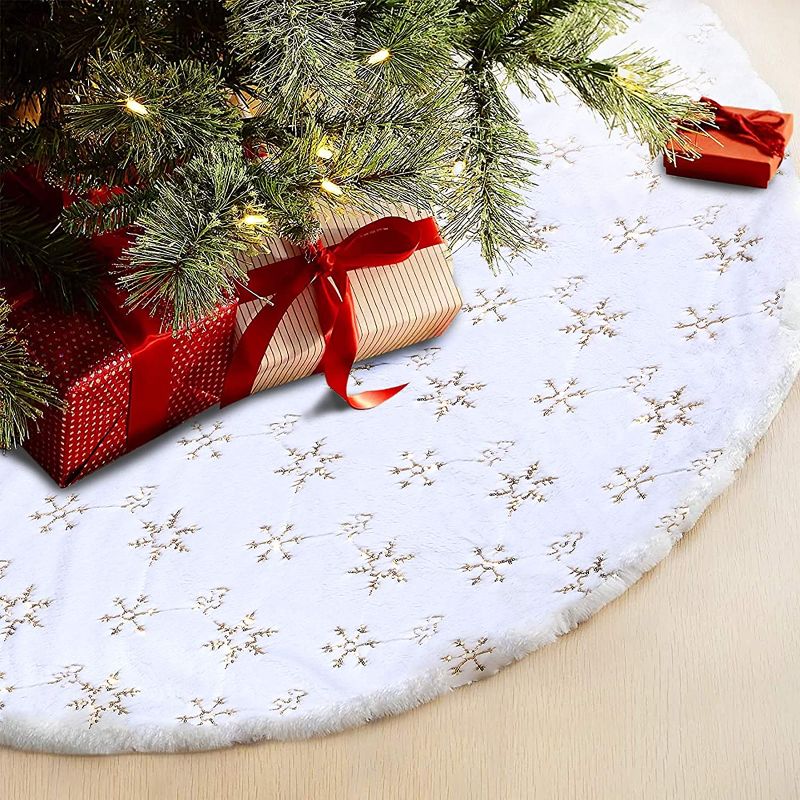 Photo 1 of Christmas Tree Skirt - 48 Inches Large Snowy White Faux Fur Tree Skirt with Golden Snowy Pattern for Christmas Decorations Indoor Outdoor
