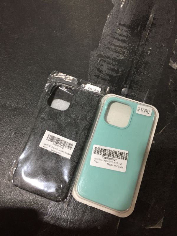 Photo 1 of IPHONE CASES (12/13)