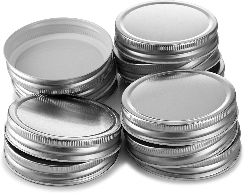 Photo 1 of Assorted mason jar lids