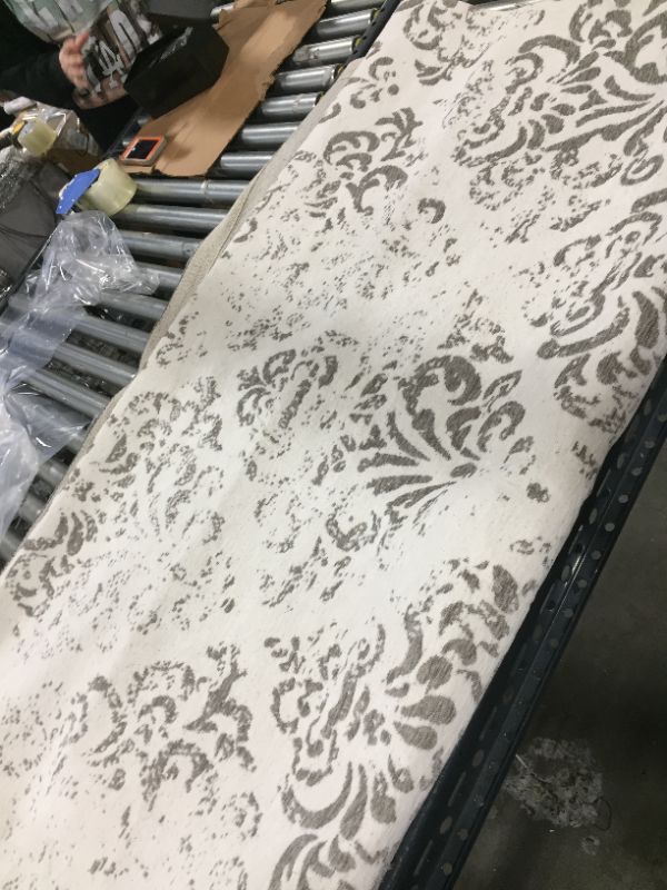 Photo 1 of 5FT x 80" white and grey rug, unknow model or manufacture 