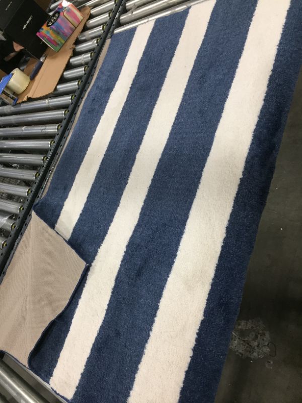 Photo 1 of 4FT x 60" blue and white bathroom rug