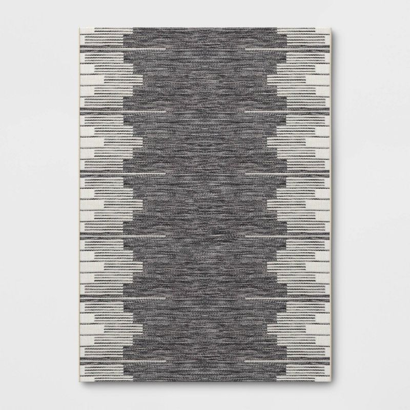 Photo 1 of 7' X 10' Graphic Steps Outdoor Rug Black - Project 62™--dirty 
