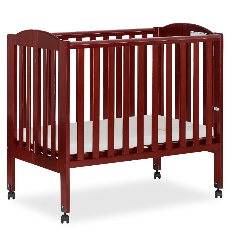 Photo 1 of Dream on Me 2-in-1 Folding Portable Crib in Cherry
