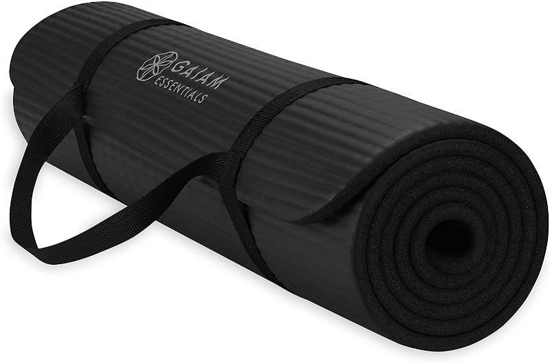 Photo 1 of Gaiam Essentials Thick Yoga Mat Fitness & Exercise Mat with Easy-Cinch Yoga Mat Carrier Strap, 72"L x 24"W x 2/5 Inch Thick
