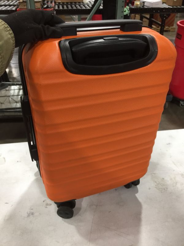 Photo 3 of Amazon Basics Hardside Spinner Suitcase Carry-On Luggage with Wheels - 20-Inch, Orange
