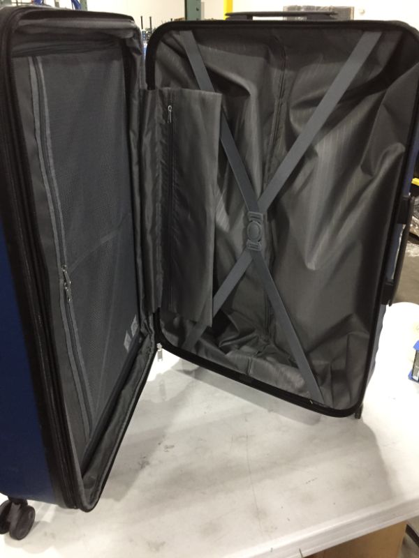 Photo 4 of Amazon Basics Hardside Spinner Suitcase Luggage with Wheels - 28-Inch, Navy Blue
