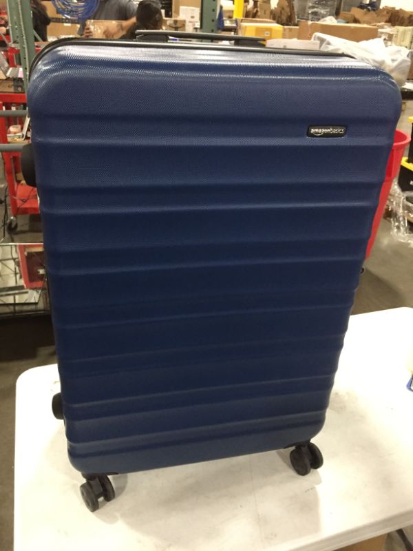 Photo 2 of Amazon Basics Hardside Spinner Suitcase Luggage with Wheels - 28-Inch, Navy Blue
