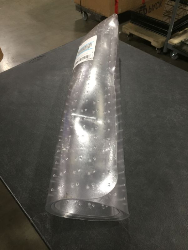 Photo 1 of CARPET MAT FOR OFFICE CHAIR 
UNKNOWN SIZE 