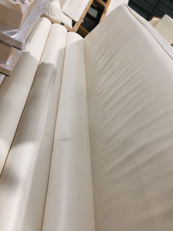 Photo 1 of CREME COLORED FAUX LEATHER L SHAPE SECTIONAL COUCH 100L X 26W X 38H INCHES (2 PIECES)