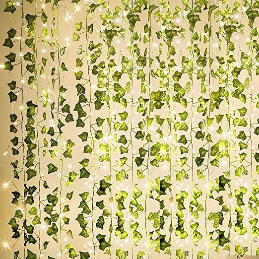 Photo 1 of 84Ft 12 Pack Artificial Ivy Garland Fake Plants, Outdoor Fake Vine UV Resistant Indoor Hanging Garland with 80 LED 33 Ft String Light, Hanging for Home, Kitchen, Garden, Wedding Décor (Green)
