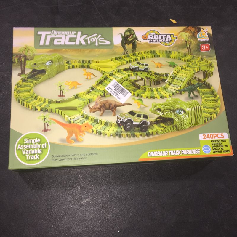 Photo 2 of Dinosaur Toys, 260 Pcs Dinosaur Car Race Track Toy with 3 Cars Playset, Includes 250 Flexible Train Track, 7 Dinosaur and 2 Dinosaur Head Best Gift for Boys...

