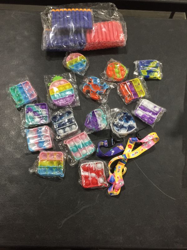 Photo 1 of BOX LOT- ADHD ANXIETY TOYS AND FOAM DARTS