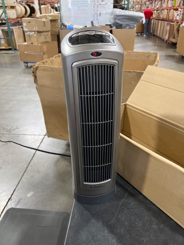 Photo 1 of Lasko 755320 Ceramic Space Tower Heater, 8.5?L x 7.25?W x 23?H, Silver
