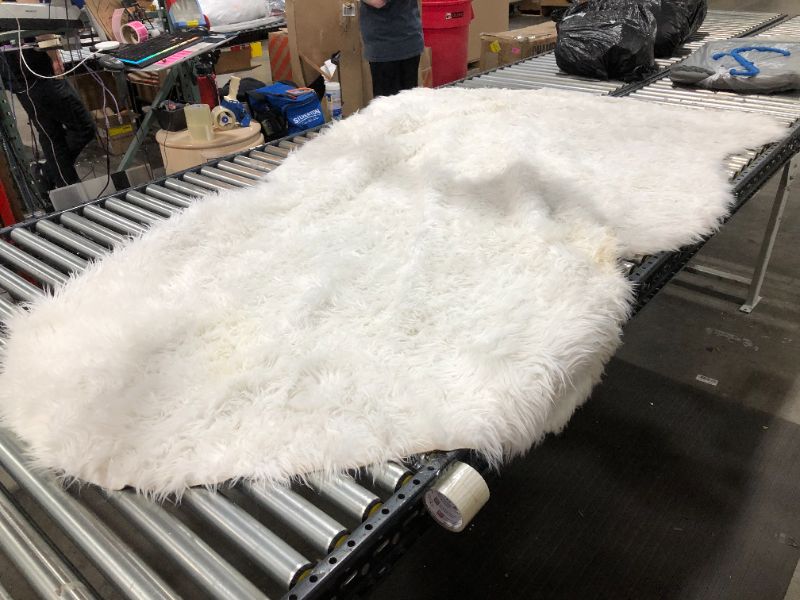 Photo 1 of 106" FAUX FUR RUG