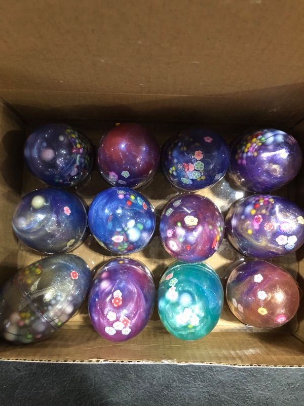 Photo 1 of JOYIN 12 Pcs Prefilled Easter Eggs with Fluffy Galaxy Slime, Colorful Putty with Assorted Accessories, Stress Relief Sludge Toys for Easter Eggs Hunt, Basket Stuffers Filler, Easter Theme Party Favor
