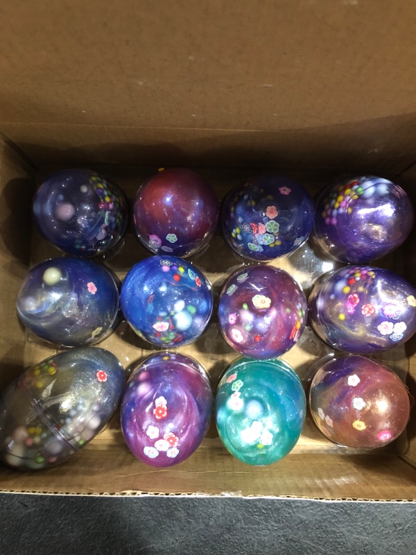 Photo 1 of JOYIN 12 Pcs Prefilled Easter Eggs with Fluffy Galaxy Slime, Colorful Putty with Assorted Accessories, Stress Relief Sludge Toys for Easter Eggs Hunt, Basket Stuffers Filler, Easter Theme Party Favor
