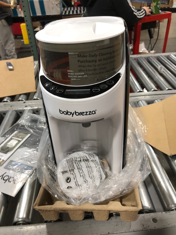 Photo 2 of New and Improved Baby Brezza Formula Pro Advanced Formula Dispenser Machine - Automatically Mix a Warm Formula Bottle Instantly - Easily Make Bottle with Automatic Powder Blending
