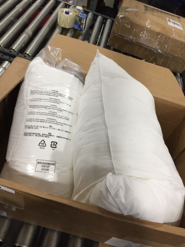 Photo 1 of 2 white pillows 