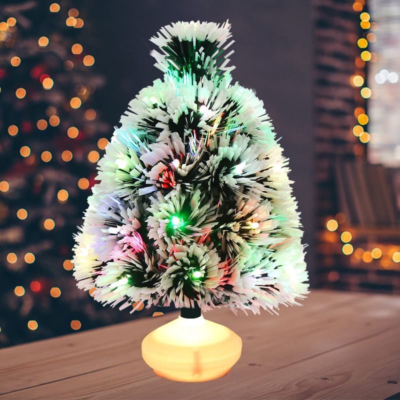 Photo 1 of CCINEE Tabletop Mini Christmas Tree with Light, 13.4 Inch Prelit Flocked Christmas Tree Battery Operated Small Xmas Tree with Flashing LED Lights for Christmas Party Home Office Decoration
