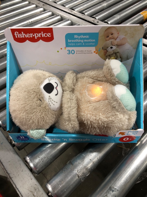 Photo 2 of Fisher-Price Soothe 'n Snuggle Otter, Portable Plush Soother with Music, Sounds, Lights and Breathing Motion, Multi
