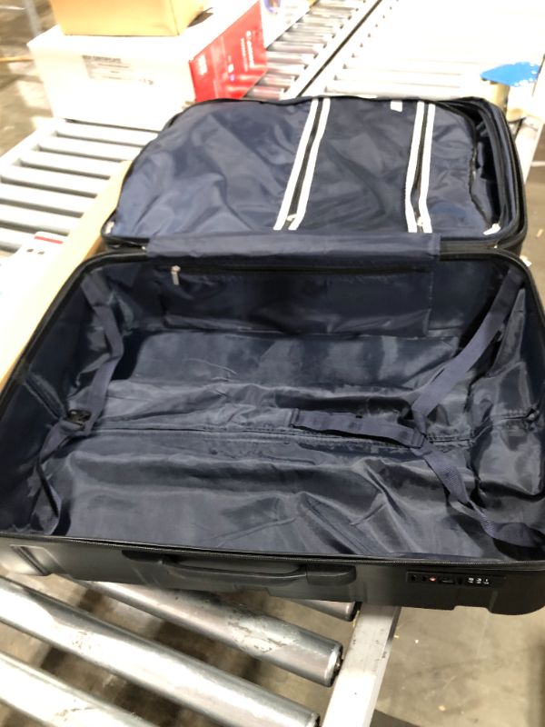 Photo 2 of 28' dark grey suitcase 