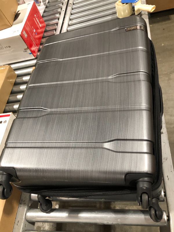 Photo 1 of 28' dark grey suitcase 