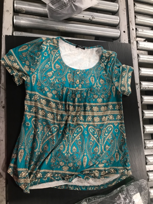 Photo 1 of Design Shirt. Size unknown (MED OR LRG)