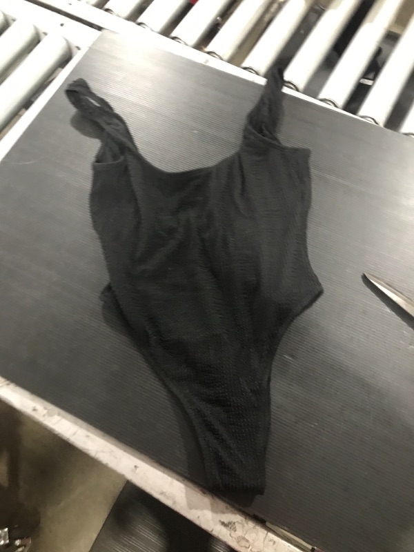 Photo 1 of Black bathing Suit. Size Med