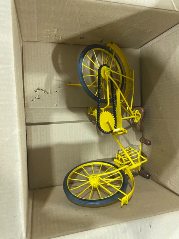 Photo 1 of Yellow Metal Toy Bike