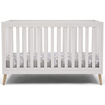 Photo 1 of Delta Children Essex 4-in-1 Convertible Baby Crib, Bianca White with Natural Legs
