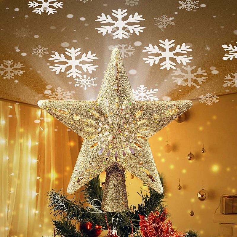 Photo 1 of Christmas Star Tree Topper with Built-in Led Snowflake Projector Lights 10 Inch Hollowed Pentagram Tree Topper,Plug in Christmas Tree Ornament for Indoor Office Xmas New Year Holiday Tree Decoration
