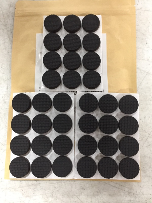 Photo 2 of Amazon Basics Rubber Furniture Pads, Black, 1'' Round, 36 pcs
