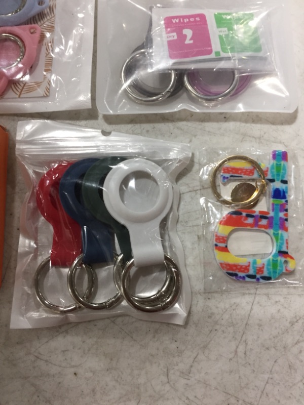 Photo 2 of VARIOUS SMART WATCH ACCESSORIES & AIR TAG KEY CHAINS.