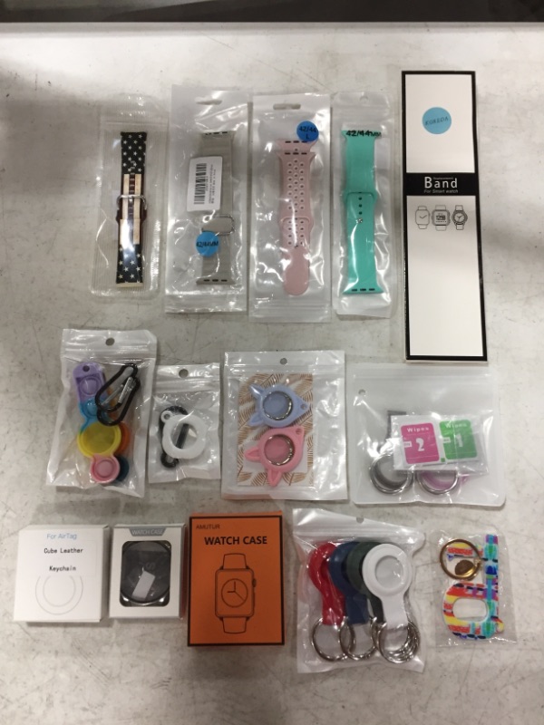 Photo 1 of VARIOUS SMART WATCH ACCESSORIES & AIR TAG KEY CHAINS.