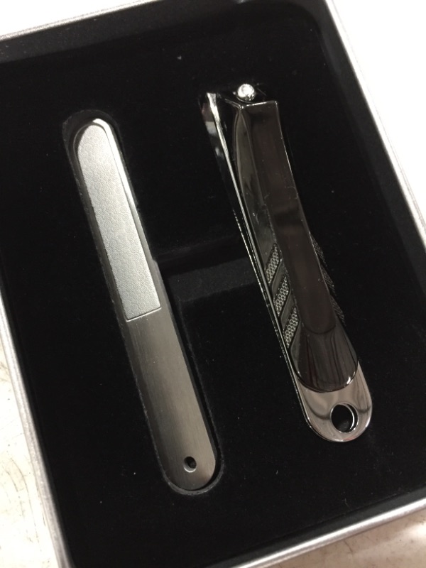 Photo 2 of MANICURE SET IN CARRYING TIN.