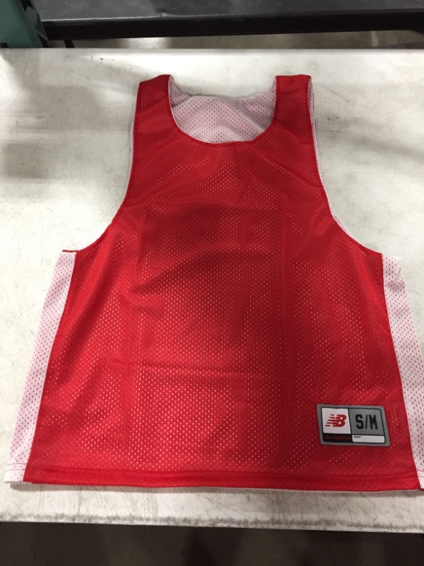 Photo 1 of NEW BALANCE BASKETBALL JERSEY RED/WHITE REVERSIBLE. SIZE S/M