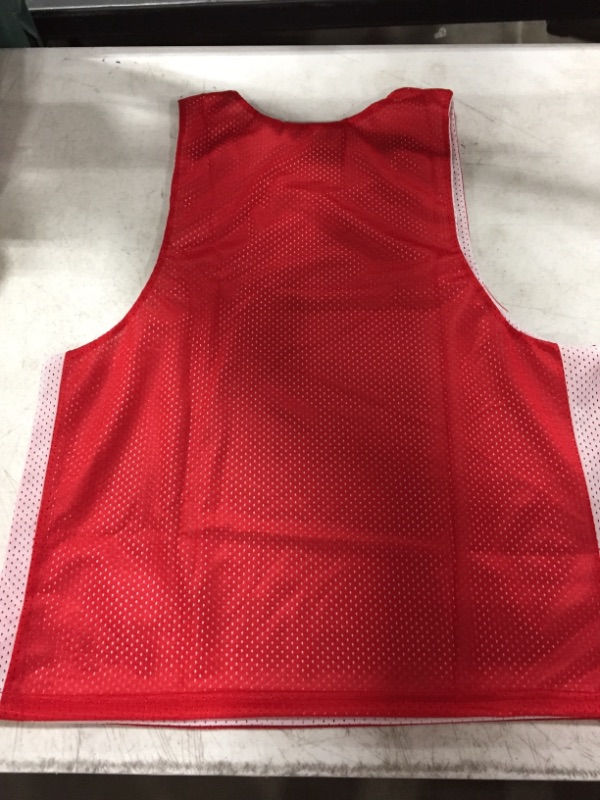 Photo 3 of NEW BALANCE BASKETBALL JERSEY RED/WHITE REVERSIBLE. SIZE S/M