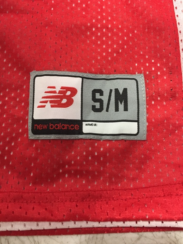 Photo 1 of NEW BALANCE BASKETBALL JERSEY RED/WHITE REVERSIBLE. SIZE S/M