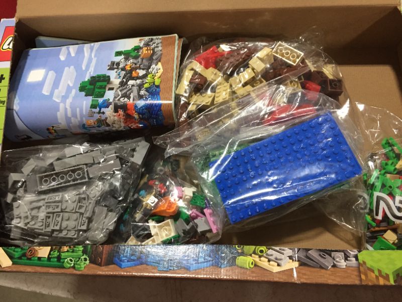 Photo 2 of LEGO Minecraft The Crafting Box 3.0 21161 Minecraft Brick Construction Toy and Minifigures, Castle and Farm Building Set, Great Gift for Minecraft Players Aged 8 and up (564 Pieces)
