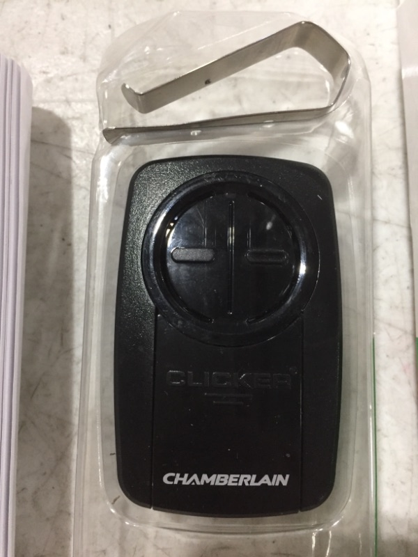 Photo 3 of Chamberlain KLIK5U-BK2 Clicker 2-Button Garage Door Opener Remote with Visor Clip, Black. OPEN BOX. PRIOR USE.
