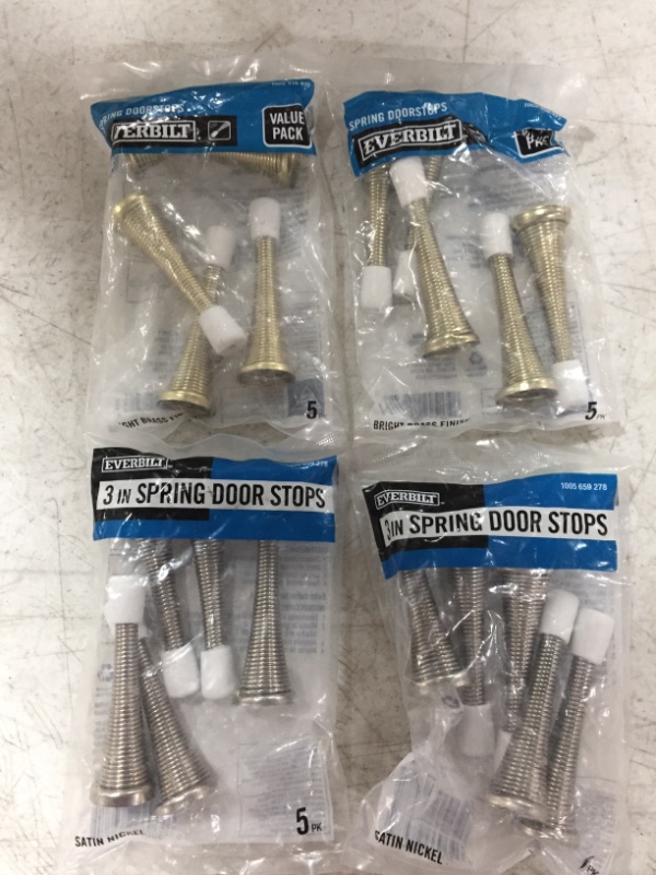 Photo 1 of EVERBILT SPRING DOORSTOPS. LOT OF 4.