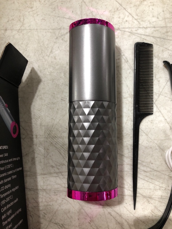 Photo 3 of CORDLESS AUTOMATIC HAIR CURLER.
