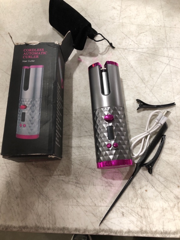 Photo 2 of CORDLESS AUTOMATIC HAIR CURLER.