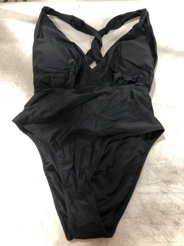 Photo 2 of Brianne Tie Front Plunging One Piece Swimsuit
SIZE XL.